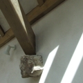 Oak truss junction with masonry wall